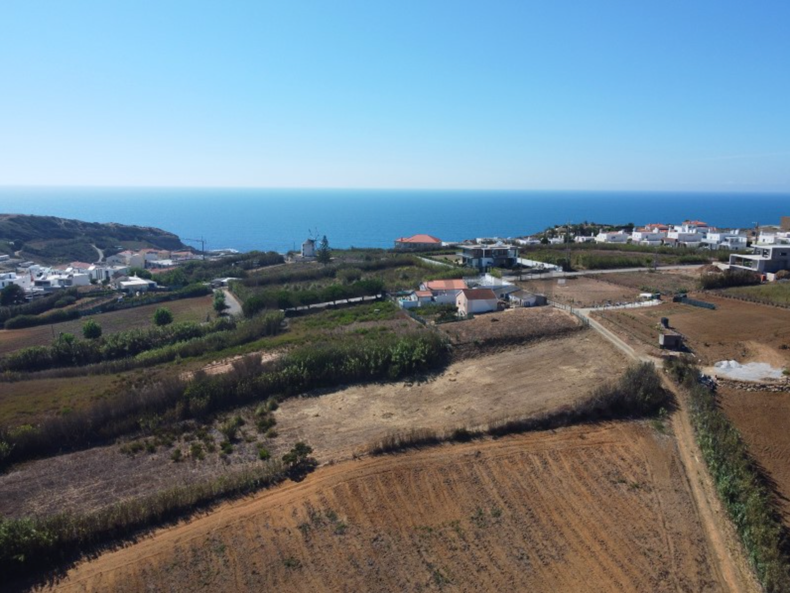 Terrain avec projet à 600 m de la plage