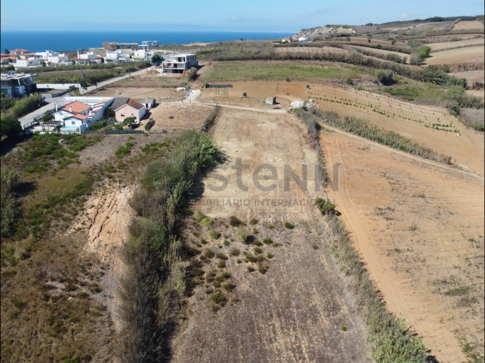 Terrain avec projet à 600 m de la plage